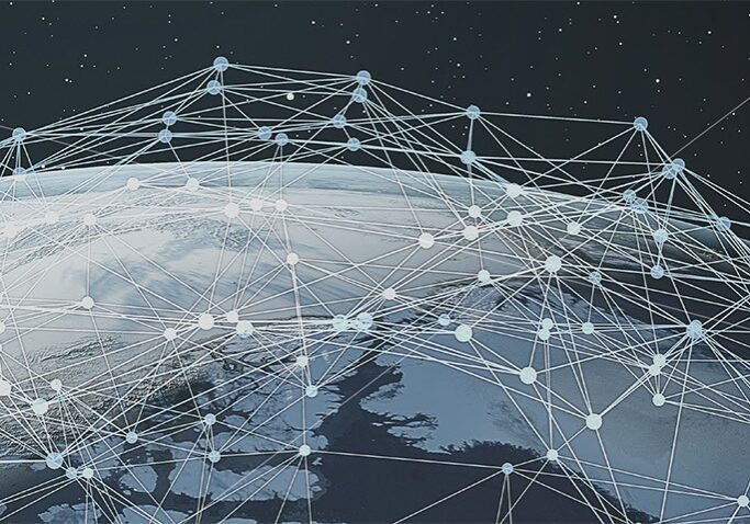 A view of Earth from space with interconnected lines and dots superimposed, representing a global network or digital communication system spanning the planet.