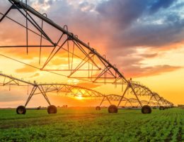 Benton County Irrigation Scheduler
Sprinklers on a farm at sunset.