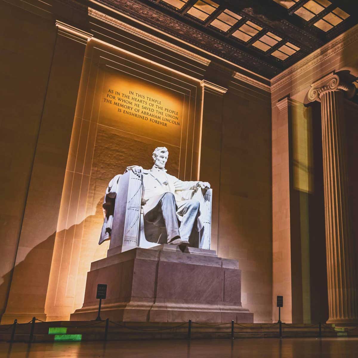 Photograph of the Lincoln Memorial and the inscription behind the statue